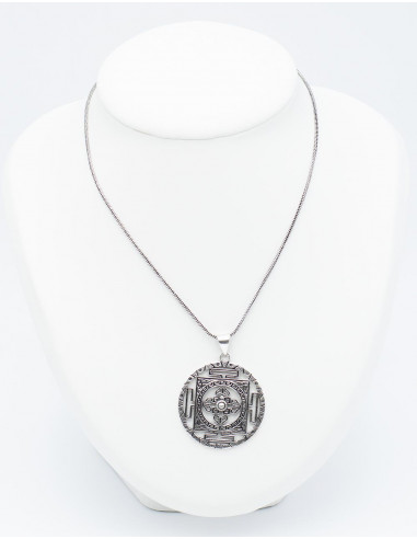 Openwork and carved pendant